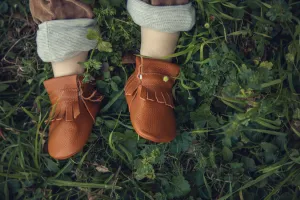Unisex tan genuine leather mocc boots